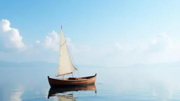 Serene boat sailing on calm water